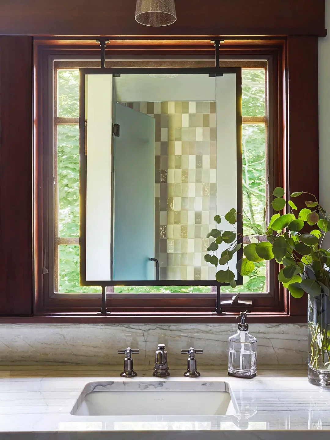8 Bathroom Mirror Hacks for When a Window Keeps Cramping Your Style