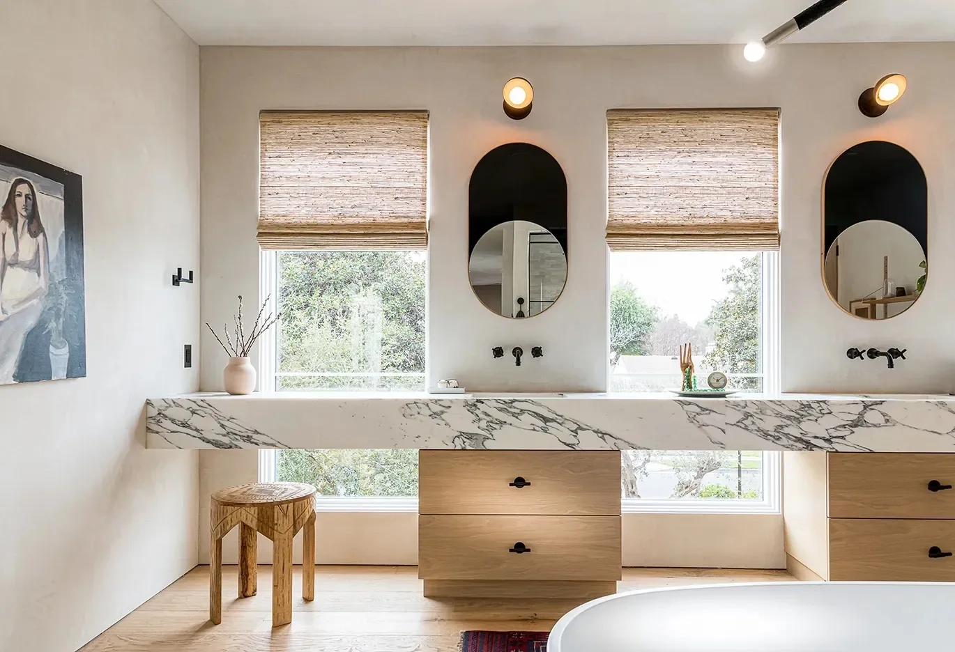 8 Bathroom Mirror Hacks for When a Window Keeps Cramping Your Style
