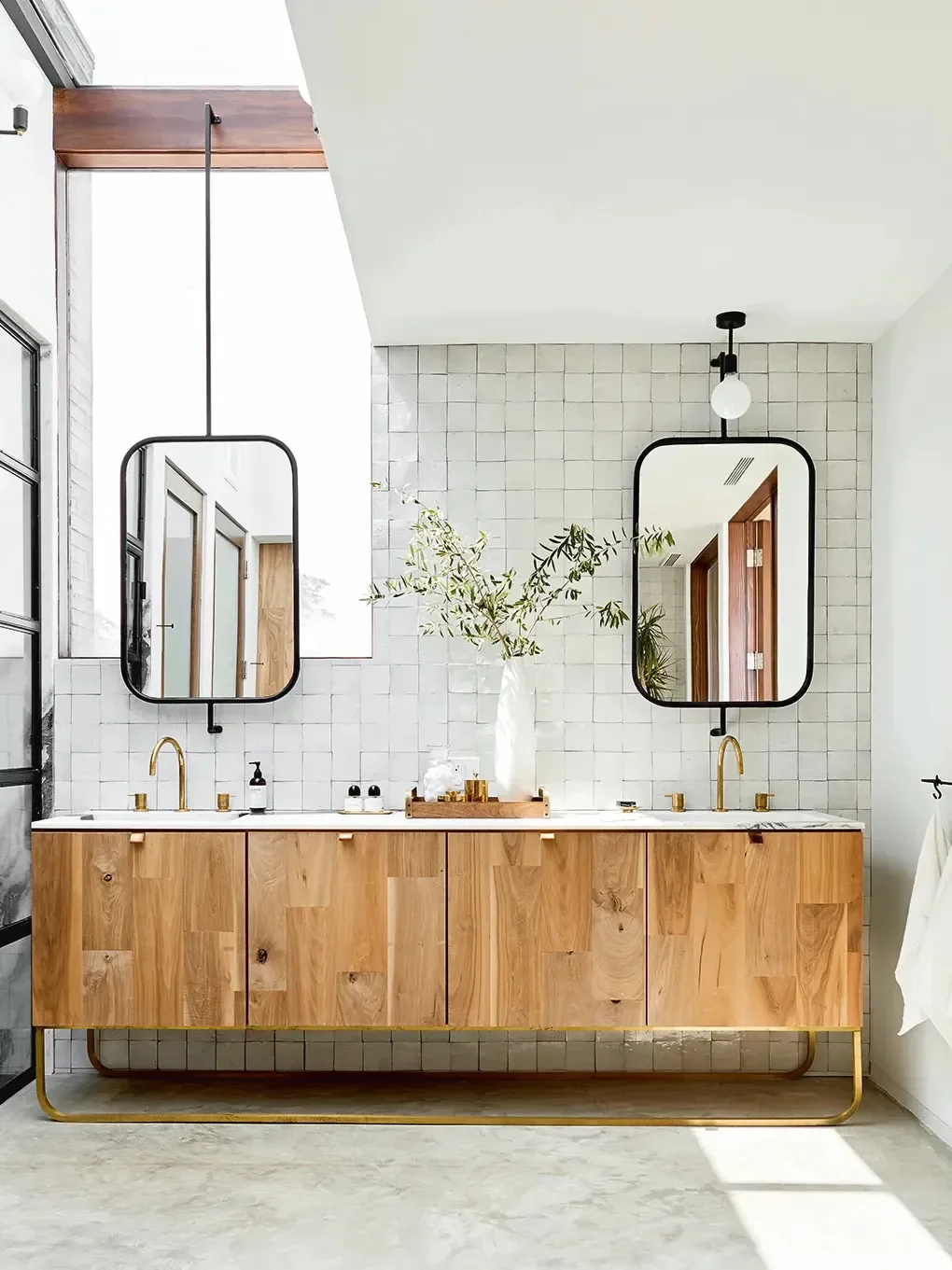 8 Bathroom Mirror Hacks for When a Window Keeps Cramping Your Style