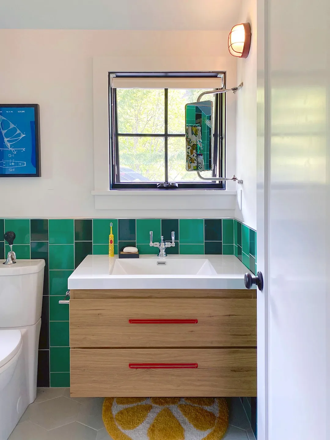 8 Bathroom Mirror Hacks for When a Window Keeps Cramping Your Style