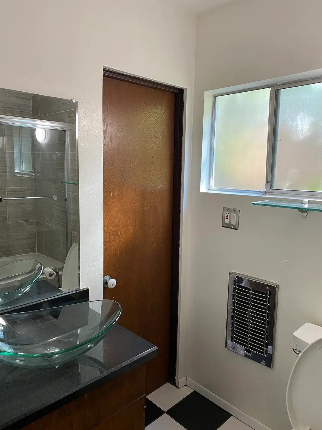 Before & After: A Nightstand Became a Vanity and This Guest Bath Went From Drab to Fab