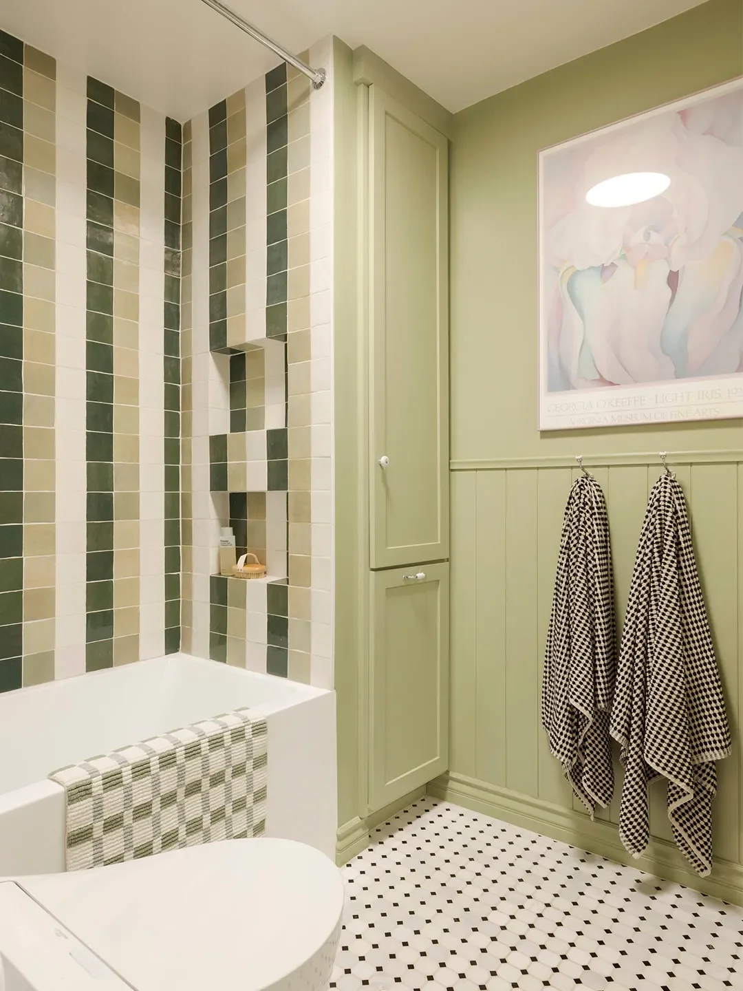 Before & After: Evicting a Cabinet Unlocked This L.A. Bathroom’s Wild Striped Shower Moment