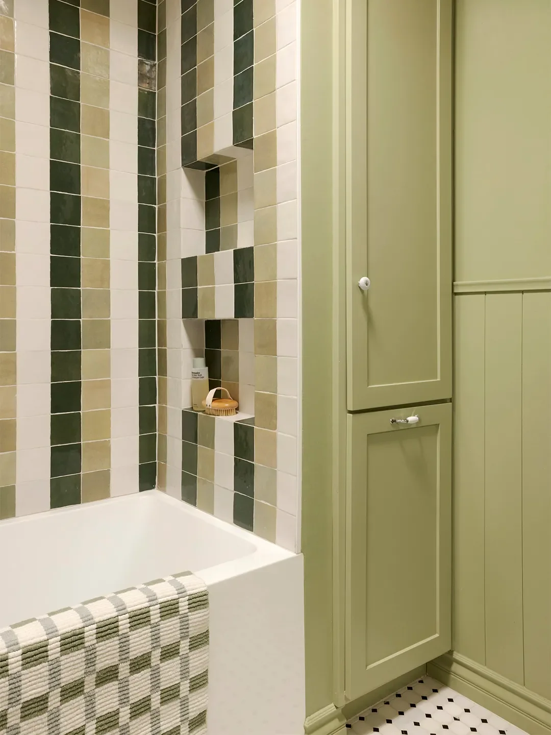 Before & After: Evicting a Cabinet Unlocked This L.A. Bathroom’s Wild Striped Shower Moment